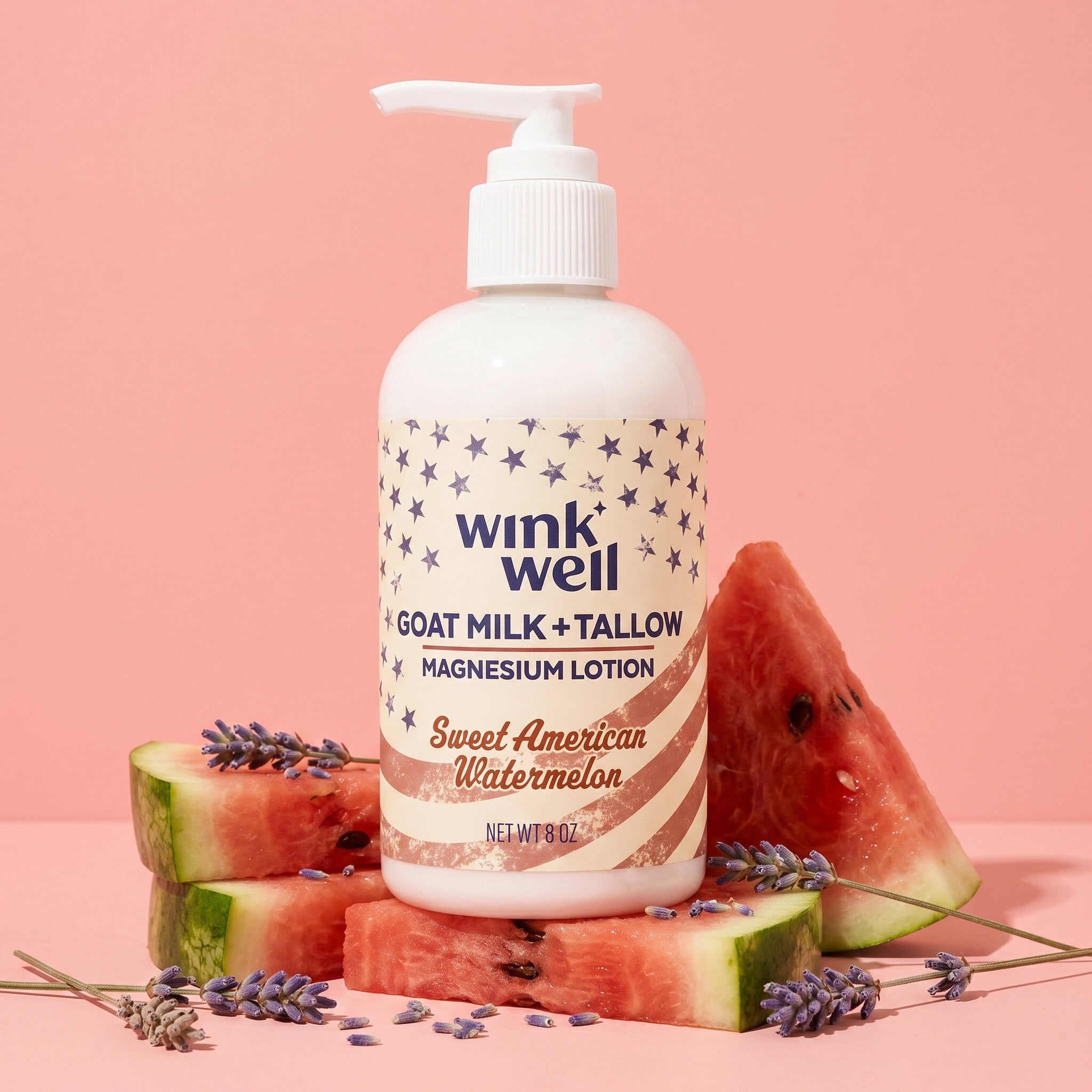 Wink Well goat milk and tallow lotion bottle with watermelon slices and lavender on a pink background