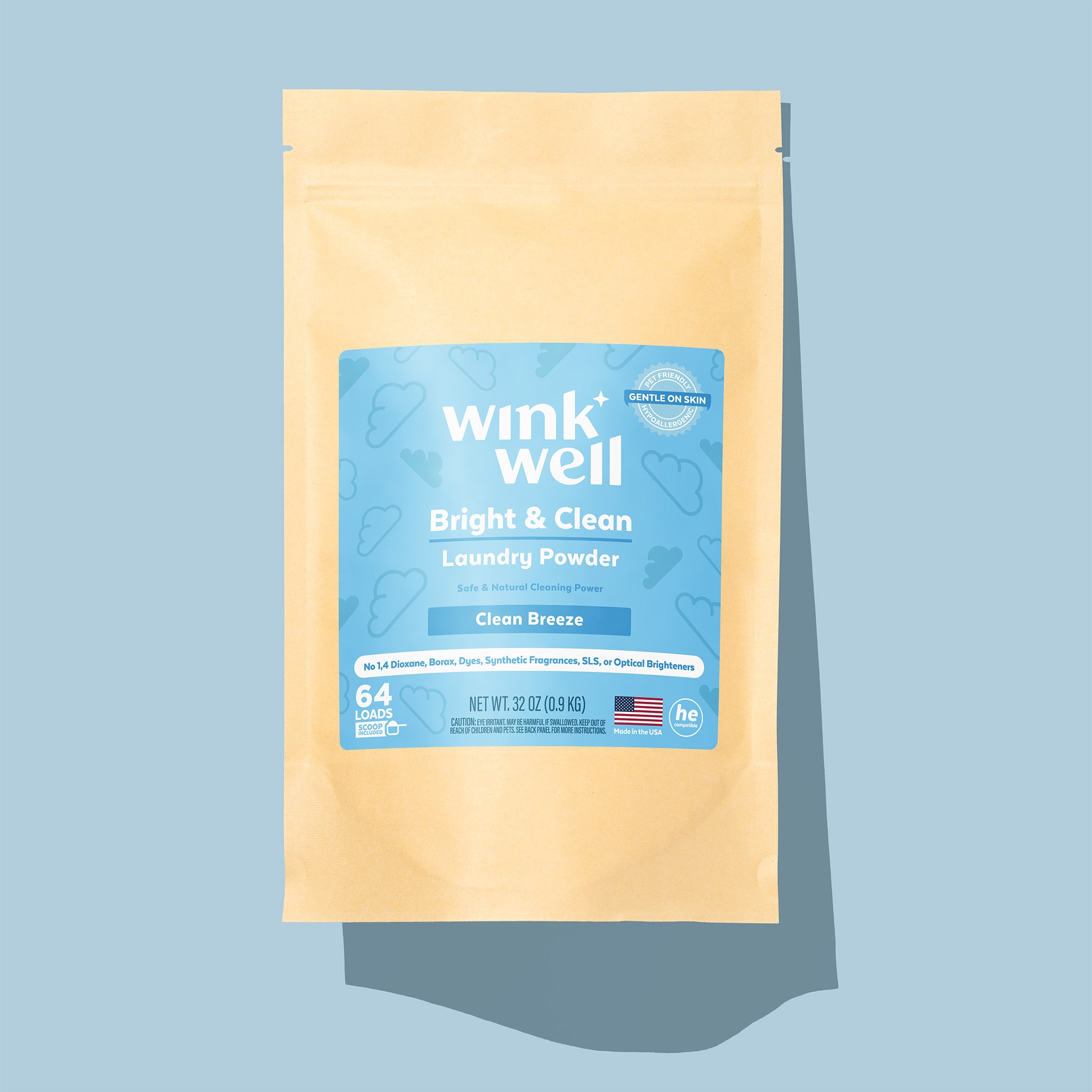 Wink Well laundry powder package on a light blue background