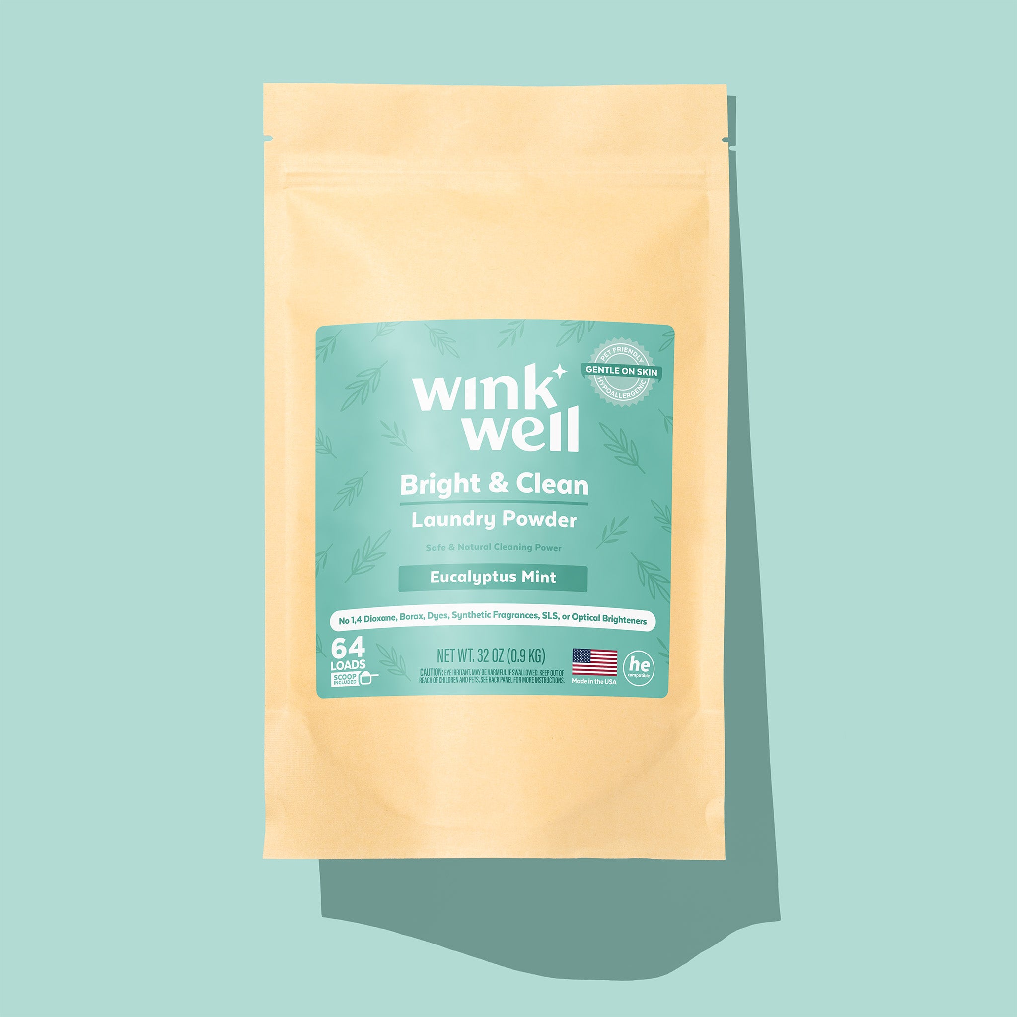 Wink Well laundry powder package on a light blue background