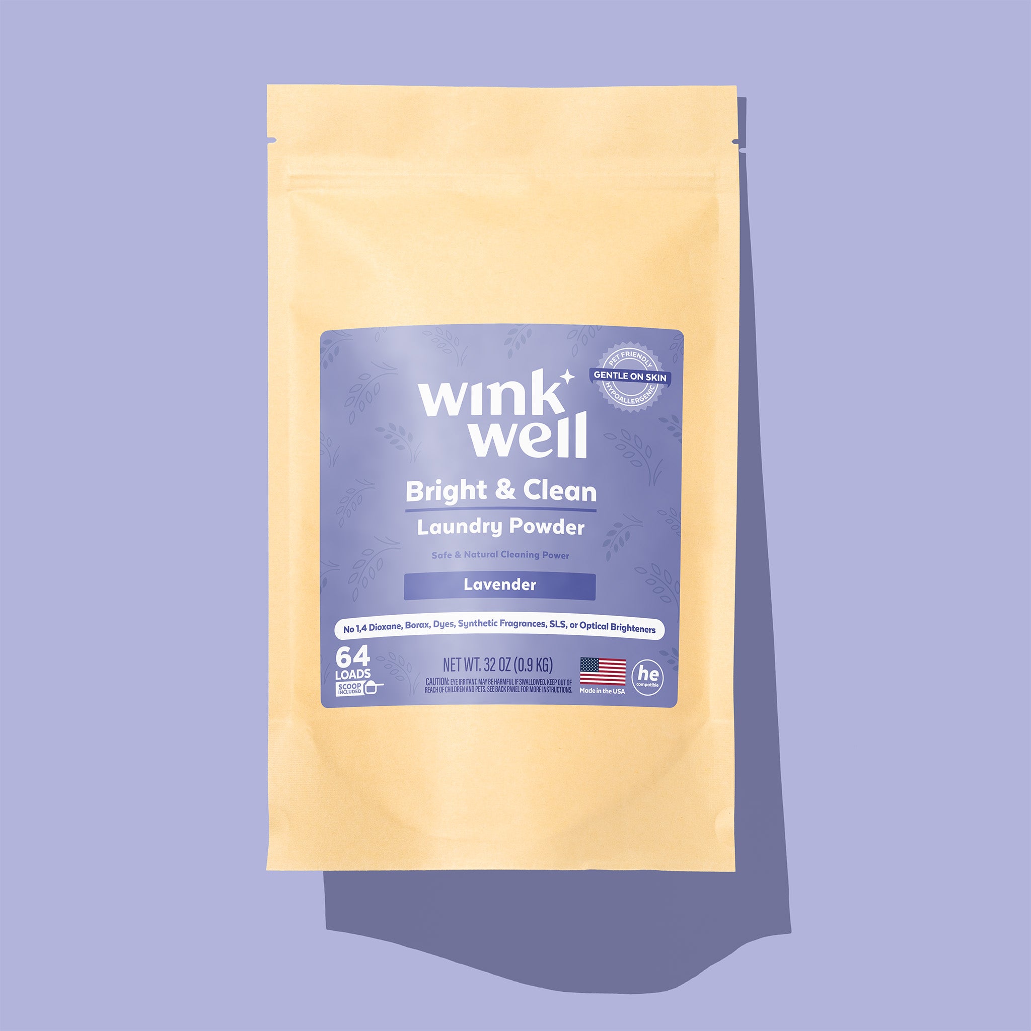 Wink Well laundry powder package on a purple background