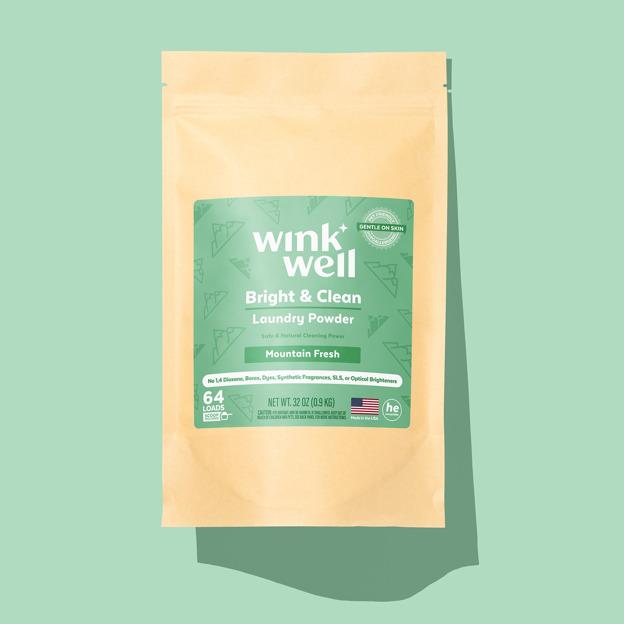 Wink Well laundry powder package on a light green background