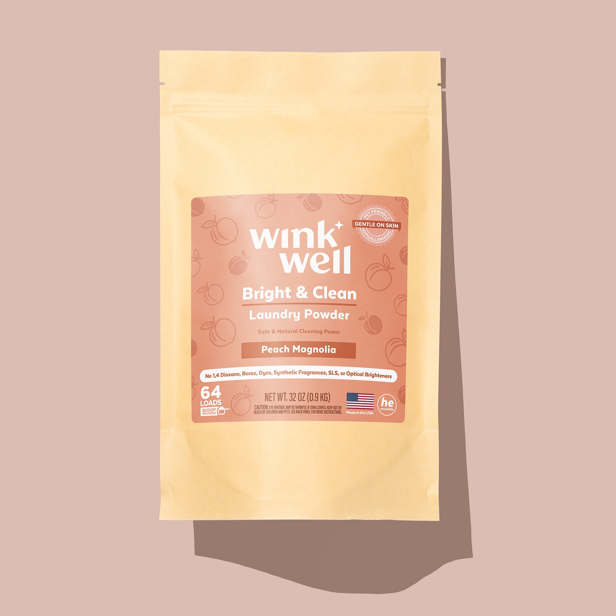Wink Well laundry powder package on a beige background