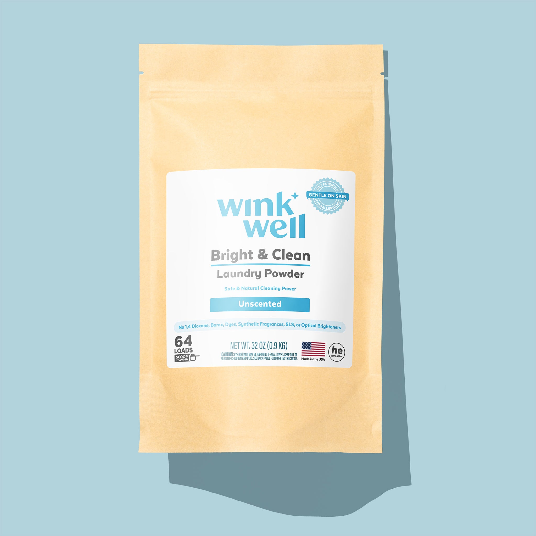 Wink Well laundry powder package on a light blue background